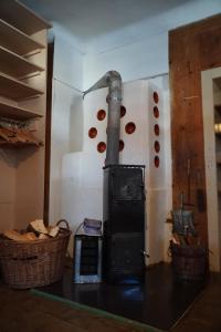 a stove with a bunch of donuts in a room at S'Platzl in Wenns