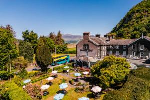 an aerial view of a building with umbrellas at The Borrowdale Hotel in Keswick