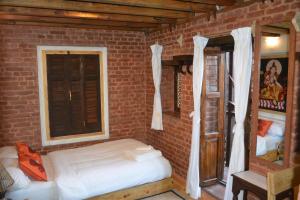 Letto o letti in una camera di Yamba Traditional Home