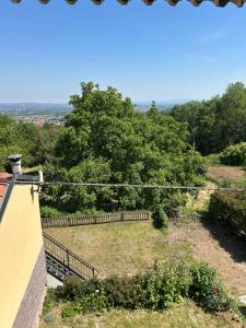 a view of a garden from a house at Da Noi Panoramic Guest Stay Camera Orizzonte in Cuorgnè +15 photos