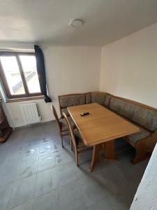 a living room with a table and a couch at myappart - FORBACH in Forbach