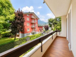 a balcony with a view of a building at Bella Vita Stays Easy in Sondrio