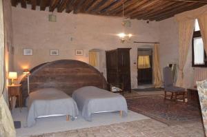 a bedroom with two beds in a room at Chateau de Chémery in Chémery