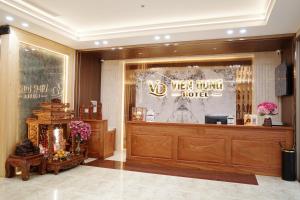 a view of a luxury hotel lobby with a window at Viễn Dung Hotel in Buon Ma Thuot