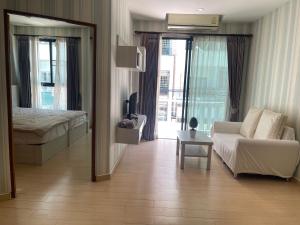 a living room with a couch and a bed and a mirror at New Abani in Jomtien Beach +21 photos