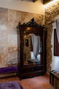 a large mirror in the corner of a room at Can marques in Cunit +8 photos