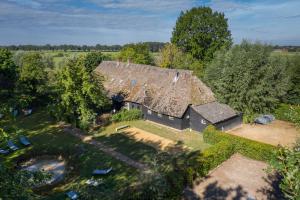 an overhead view of an old house with a roof at Hof van Vijfeijken in Boxtel
