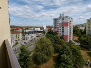 an aerial view of a city with buildings and a street at Apartmán Malohont in Rimavská Sobota