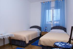 Кровать или кровати в номере Apartment Jasovic