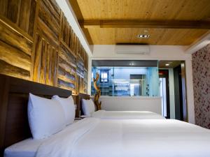 سرير أو أسرّة في غرفة في Bethlehem B&B