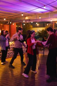 a group of people dancing on a dance floor at Yellowsquare Athens in Athens