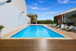 a swimming pool on the roof of a building at Spirit Hotel Fonte Real in Monte Real