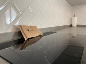 a paper bag sitting on top of a table at R2R - Apartamentos Prellezo - C20C03 in Prellezo