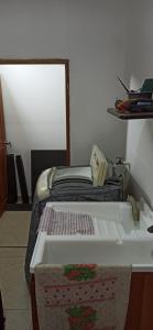 a small room with a bed and a table at Atardeceres in Puerto Rey +10 photos