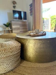 a living room with a coffee table and a couch at Bavella in Zonza