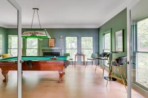 a pool table in a room with green walls at Scenic, Spacious Riverside Retreat Ropeyarn in Deltaville