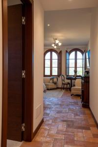 a hallway of a home with a living room at Tolaini Winery Suites in Castelnuovo Berardenga