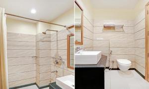 a bathroom with a sink and a toilet at Galaxy Family Hotel Karachi Airport in Karachi