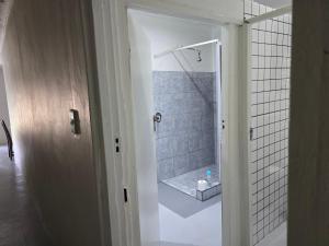 a bathroom with a shower with a walk in shower at Tranquility PsJ in Port St. Johns +63 photos