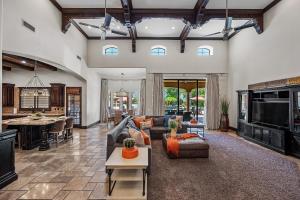 a living room with couches and a kitchen at 104th Mesa 1331 Paradise Found in Mesa
