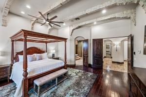 a bedroom with a bed and a ceiling fan at 104th Mesa 1331 Paradise Found in Mesa +183 photos