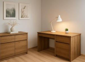a desk with a lamp and a dresser in a room at Apartament 1go Maja TK in Namysłów
