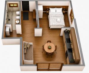 a floor plan of a room with a bed and a table at Lake Retreat in Anfo