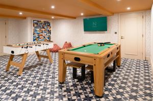 two billiards tables in a room with at THE NICI Newquay in Newquay