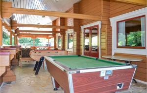 a room with a pool table in a house at Chalet Chez Jeannot, N6 in Mauroux