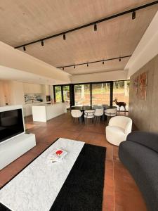 a living room with a couch and a table at Cit'Art in Namur