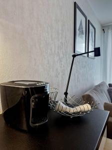 a toaster sitting on top of a table at Apartmán Hestia 5 in Rajecké Teplice