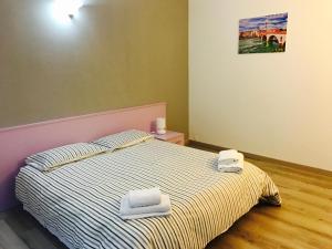 Postel nebo postele na pokoji v ubytování Simoni 10