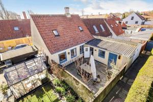 an overhead view of a house with a surfboard on a deck at AE330-Aeroskobing-Ostergade-8 in Ærøskøbing