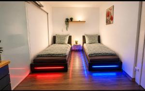 a room with two beds in a room at Ferienwohung M&A in Kulz