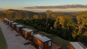 an overhead view of a row of houses in the mountains at Refúgio Tapera Bungalows & Wellness in Venda Nova do Imigrante
