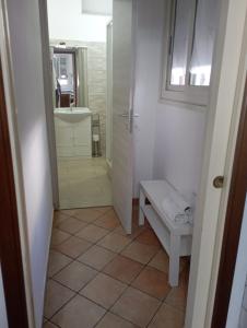 a bathroom with a shower and a toilet in it at MisterBeB in Misterbianco