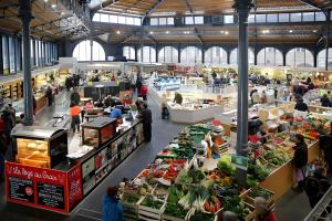a large market with a large group of people in it at La Ferme Du Marronnier in Valence-dʼAlbigeois
