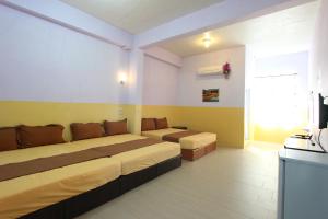 TV in/ali zabaviščno središče v nastanitvi Wu Li Ting B&B
