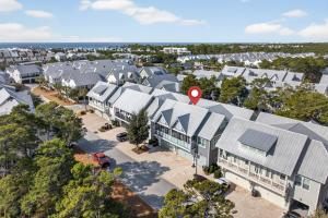 an aerial view of a residential neighborhood with houses at Mystic Seas in Watersound Beach