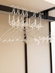 a bunch of wine glasses hanging from a rack at Il borgo blu in Tortoreto Lido