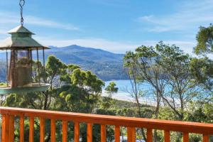 a view of the water from a deck with a gazebo at Eaglehawk Neck Getaway in Eaglehawk Neck
