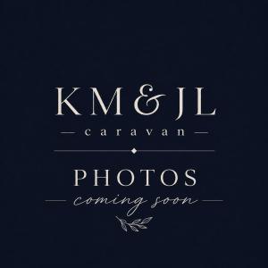 a logo for a photography company with a black background at KM & JL Caravan in Cresswell