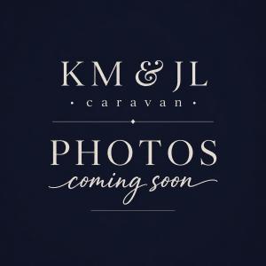 a sign that reads kim jil caravan photos coming soon at KM & JL Caravan in Cresswell
