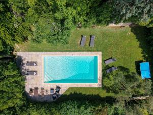 an overhead view of a swimming pool in a yard at lemasrocamour in Roquemaure +4 photos