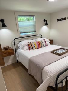 a bedroom with two beds and a window at Sunapee Getaway With Lake Access in Sunapee