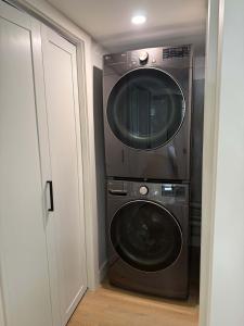 a washing machine and a dryer in a room at Sunapee Getaway With Lake Access in Sunapee +33 photos