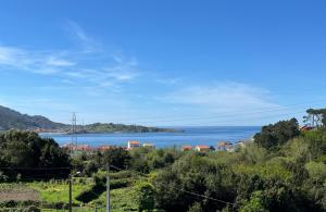 a view of a large body of water at Casa Ezaro in Dumbría