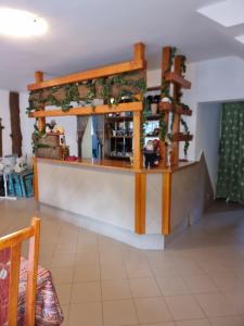 a bar with a counter in a room at Pokoje Poniatowka in Nałęczów