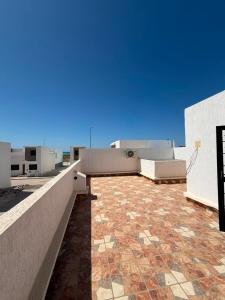 a view of the roof of a building at Mini Villa Azur - Bord de Mer in Driouch