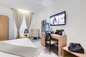 TV a/nebo společenská místnost v ubytování Relais Colonna